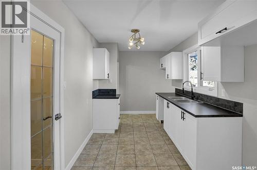 186 Coldwell Road, Regina, SK - Indoor Photo Showing Kitchen With Double Sink