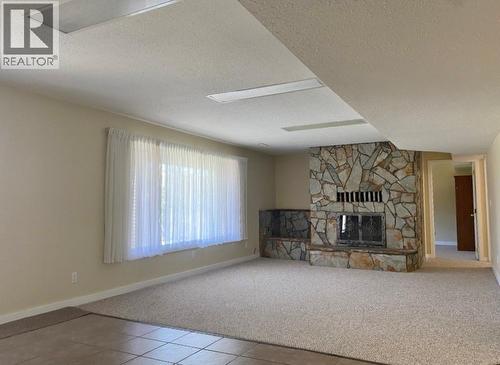 7437 Valley Heights Drive, Grand Forks, BC - Indoor With Fireplace