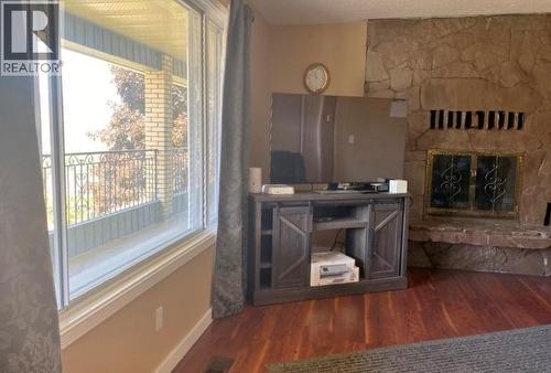 7437 Valley Heights Drive, Grand Forks, BC - Indoor Photo Showing Other Room With Fireplace