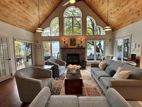 739 Sandy Bay Road, Haldimand, ON - Indoor Photo Showing Living Room With Fireplace