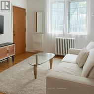 4 - 28 SPRINGHURST AVENUE  Toronto, ON M6K 1B3