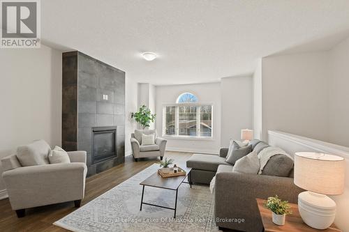 12 Macarthur Drive, Bracebridge (Monck (Bracebridge)), ON - Indoor Photo Showing Living Room With Fireplace