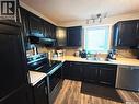 331 4Th Street, Weyburn Rm No. 67, SK  - Indoor Photo Showing Kitchen With Double Sink 