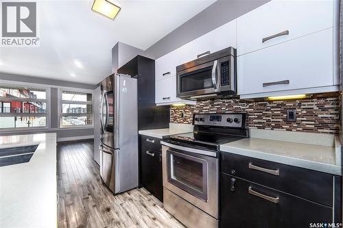 143 Marlatte Crescent, Saskatoon, SK - Indoor Photo Showing Kitchen With Stainless Steel Kitchen With Upgraded Kitchen