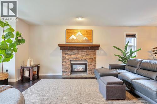2077 Rosefield Drive, West Kelowna, BC - Indoor Photo Showing Living Room With Fireplace