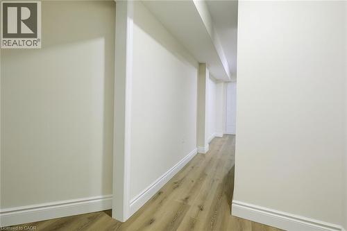 Hallway featuring baseboards and light wood-style floors - 19 Sassafras Street Unit# Lower, Kitchener, ON - Indoor Photo Showing Other Room