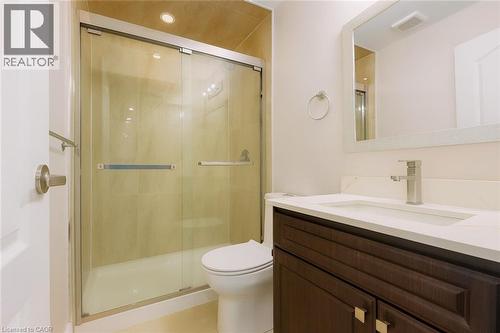 Bathroom with vanity, a stall shower, and tile patterned flooring - 19 Sassafras Street Unit# Lower, Kitchener, ON - Indoor Photo Showing Bathroom
