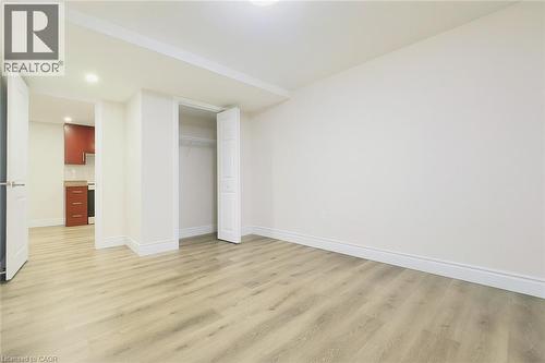 Unfurnished bedroom featuring light wood-style flooring, a closet, and recessed lighting - 19 Sassafras Street Unit# Lower, Kitchener, ON - Indoor Photo Showing Other Room