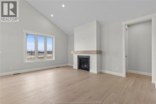 510 Orsini, Lakeshore, ON - Indoor Photo Showing Living Room With Fireplace