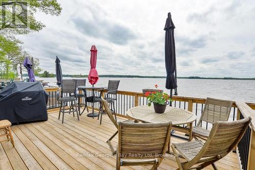 Beach Chalet #3 - 1230 Grandview Lodge Road, Severn, ON - Outdoor With Body Of Water With Deck Patio Veranda With Exterior