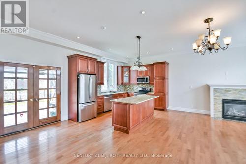 16 Gray Lane, Barrie, ON - Indoor Photo Showing Kitchen With Fireplace