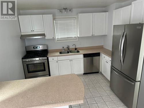 130 Sekura Crescent, Cambridge, ON - Indoor Photo Showing Kitchen With Double Sink