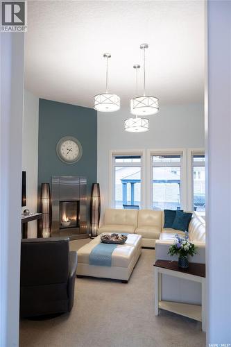 15 Broadway Street S, Redvers, SK - Indoor Photo Showing Living Room With Fireplace