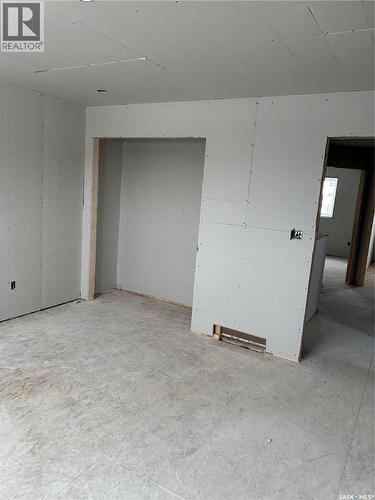13 Clement Road, Lanigan, SK - Indoor Photo Showing Garage