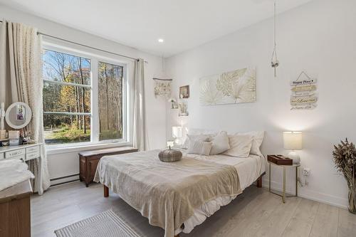 Chambre à coucher principale - 120 Rue Bellefeuille, Saint-Calixte, QC - Indoor Photo Showing Bedroom