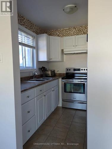 107 - 1490 Heron Road, Ottawa, ON - Indoor Photo Showing Kitchen With Double Sink