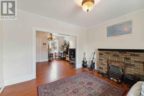 235 Cambridge Street N, Ottawa, ON - Indoor Photo Showing Living Room With Fireplace