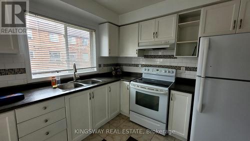 38 - 2 Clay Brick Court, Brampton, ON - Indoor Photo Showing Kitchen With Double Sink