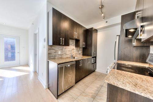 Salle familiale - 409-4550 Rue Hochelaga, Montréal (Mercier/Hochelaga-Maisonneuve), QC - Indoor Photo Showing Kitchen With Upgraded Kitchen