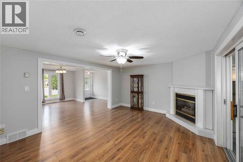 1940 London Line Unit# 107, Sarnia, ON - Indoor Photo Showing Living Room With Fireplace