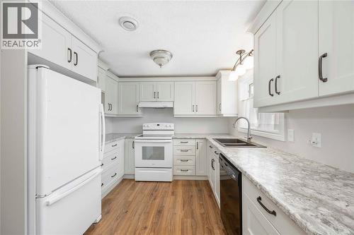 1940 London Line Unit# 107, Sarnia, ON - Indoor Photo Showing Kitchen With Double Sink