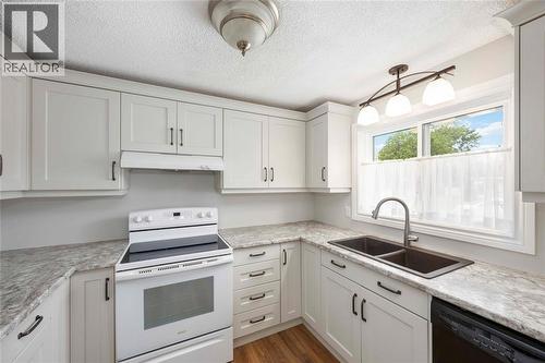 1940 London Line Unit# 107, Sarnia, ON - Indoor Photo Showing Kitchen With Double Sink