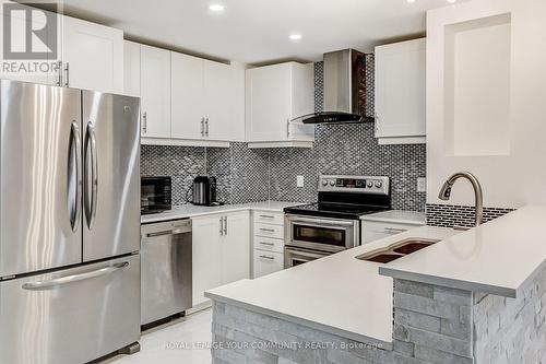 2 Green Darner Trail, Bradford West Gwillimbury, ON - Indoor Photo Showing Kitchen With Double Sink With Upgraded Kitchen
