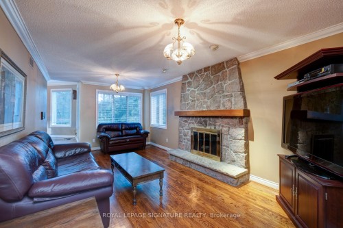 4 Ruth Court, Whitchurch-Stouffville, ON - Indoor Photo Showing Living Room With Fireplace
