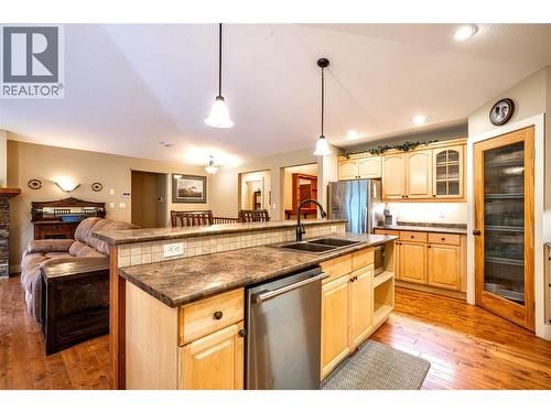 Kitchen Island with dishwasher and sink - 1701 Mountain View Avenue, Lumby, BC - Indoor Photo Showing Kitchen With Double Sink