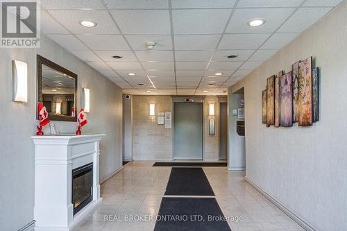 803 - 45 Pond Mills Road, London South (South J), ON - Indoor Photo Showing Other Room With Fireplace