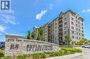 View of community sign - 776 Laurelwood Drive Unit# 609, Waterloo, ON  - Outdoor With Balcony With Facade 