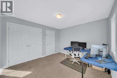 Home office with carpet flooring and baseboards - 43 Sugar Trail, Kitchener, ON - Indoor Photo Showing Office