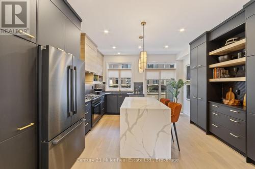 Model home shown. Upgrades at extra cost. - 30 - 280 Melody Common, Oakville (Ro River Oaks), ON - Indoor Photo Showing Kitchen With Upgraded Kitchen