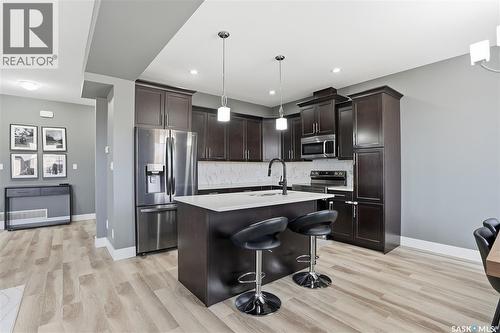 17 600 Maple Crescent, Warman, SK - Indoor Photo Showing Kitchen With Stainless Steel Kitchen With Upgraded Kitchen