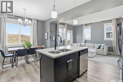 17 600 Maple Crescent, Warman, SK - Indoor Photo Showing Kitchen With Double Sink With Upgraded Kitchen