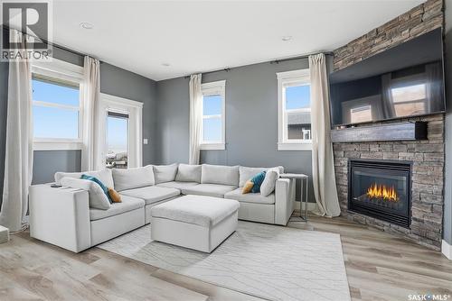 17 600 Maple Crescent, Warman, SK - Indoor Photo Showing Living Room With Fireplace