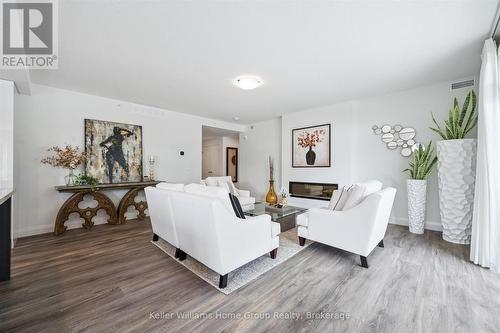 102 - 99A Farley Road, Centre Wellington (Fergus), ON - Indoor Photo Showing Living Room With Fireplace