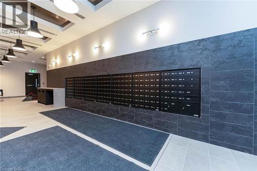 Mailboxes with separate large parcel room - 741 King Street W Unit# 301, Kitchener, ON - Indoor Photo Showing Other Room