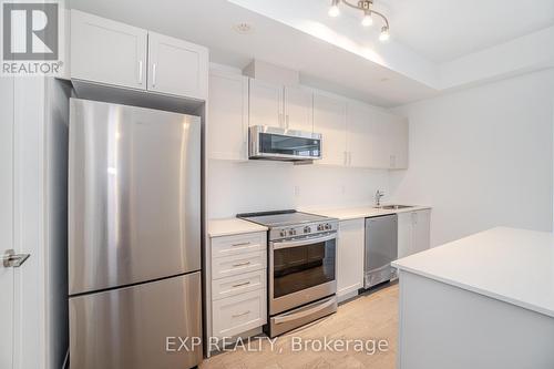 229 - 1062 Douglas Mccurdy Comm Court, Mississauga, ON - Indoor Photo Showing Kitchen With Stainless Steel Kitchen With Upgraded Kitchen