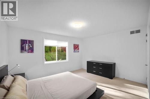 Bedroom featuring carpet and baseboards - 850 Munich Circle, Waterloo, ON - Indoor Photo Showing Bedroom