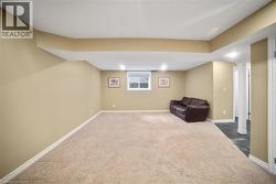 Unfurnished room with carpet and baseboards - 