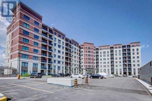 417 - 39 New Delhi Drive, Markham, ON - Outdoor With Balcony With Facade