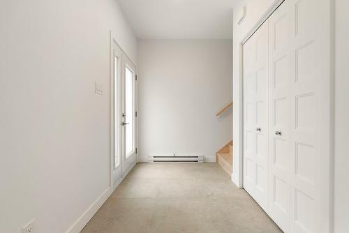 Hall d'entrée/Vestibule - 9320 Av. Becquet, Québec (La Haute-Saint-Charles), QC - Indoor Photo Showing Other Room