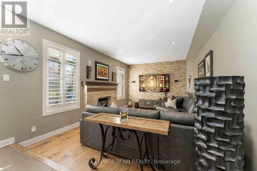 1466 Rhea Place, Ottawa, ON - Indoor Photo Showing Living Room With Fireplace