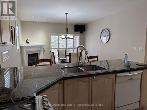 37 Chevrolet Drive, Brampton, ON - Indoor Photo Showing Kitchen With Fireplace With Double Sink