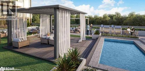 View of swimming pool featuring a deck - 2343 Khalsa Gate Unit# 201, Oakville, ON - Outdoor With In Ground Pool