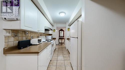 203 - 58 Sidney Belsey Crescent, Toronto, ON - Indoor Photo Showing Kitchen