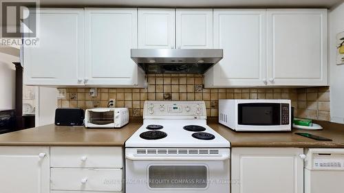 203 - 58 Sidney Belsey Crescent, Toronto, ON - Indoor Photo Showing Kitchen