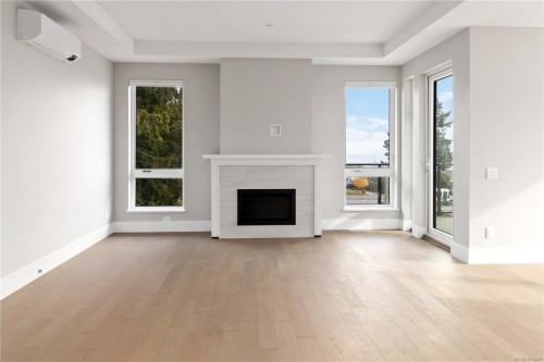 306-986 Doumac Ave, Saanich, BC - Indoor Photo Showing Living Room With Fireplace