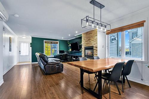 Salle à manger - 471 Place Du Louvre, Mascouche, QC - Indoor With Fireplace
